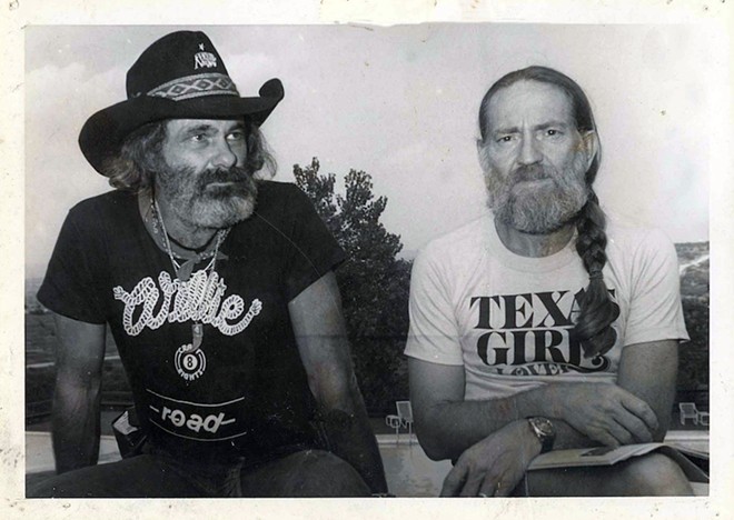 Kindrick (left) shares a moment with Texas country icon Willie Nelson. - Sam Kindrick Collection, The Wittliff Collections