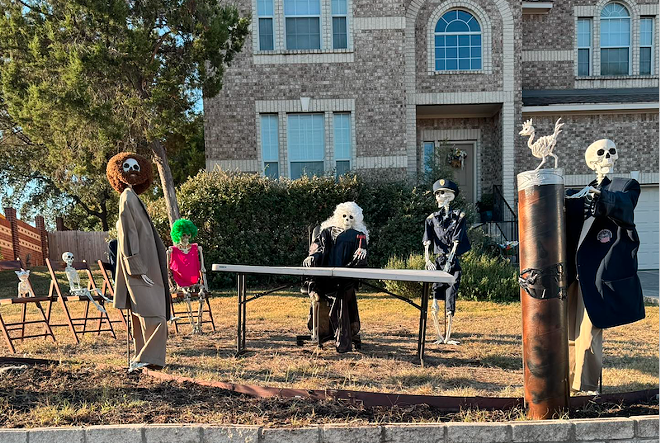 The bony residents of San Antonio's Skeleton House hold spooky court on Wednesday. - Facebook / Skeleton House of San Antonio