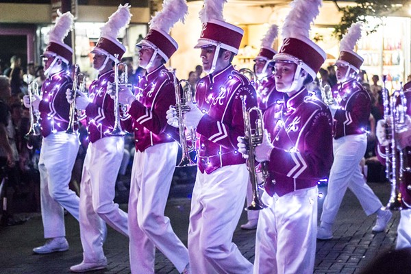 Light Up Your Saturday Night with the Illuminated Fiesta Flambeau Parade