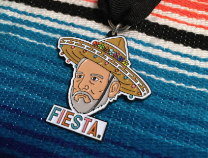 Serious-Faced Coach Pop Wears Sombrero in Hilarious Fiesta Medal