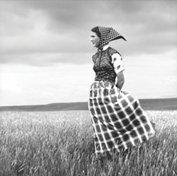 Laura Wilson, Hutterite Girl in Field, Duncan Ranch Colony, Harlowton, Montana (Briscoe Western Art Museum)