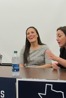 Lucinda Guinn (left) and Gina Ortiz Jones (center) listen to Tiffany Muller make a point during Friday's panel discussion.