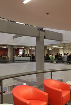 Employees meet inside Rackspace's corporate headquarters.