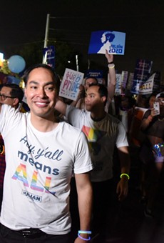 Julian Castro waves to the crowd during the Pride Bigger Than Texas Parade.