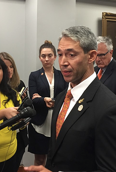 Mayor Ron Nirenberg, pictured here at a 2018 press conference, says coronavirus evacuees at Lackland must be tested again before being released.