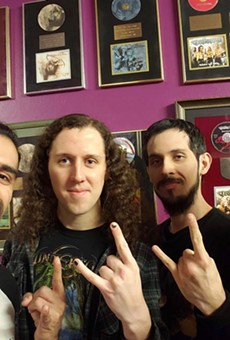 The San Antonio metal band poses with  renowned Finnish producer Anssi Kippo (right) while recording its latest album.