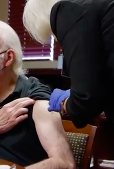 Spurs Coach Gregg Popovich receives a COVID-19 vaccine in a new public service announcement.