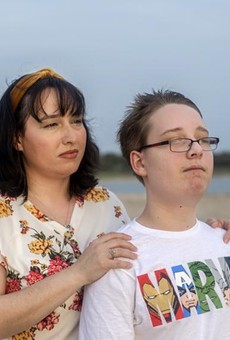 Trish and her 12-year-old son look out into the sunset at Canyon Lake on April 13, 2021. Trish earns too much to qualify for Medicaid in Texas but too little to afford her own health insurance. Her son does qualify for Medicaid.