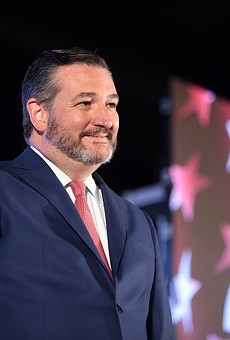 U.S. Sen. Ted Cruz smirks from the stage at a 2019 event hosted by conservative group Turning Point USA.