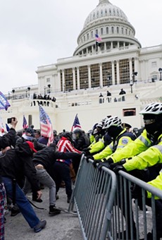 Insurrectionists tangle with police during the January 6 insurrection at the U.S. Capitol.