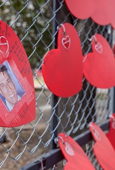 More than 3,400 red hearts were posted on a fence last year to honor San Antonio residents who have died from COVID-19 during the pandemic.