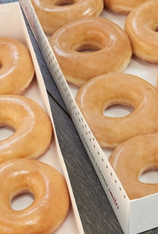 Krispy Kreme is giving away dozens of free glazed donuts.