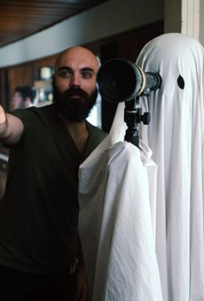 Filmmaker David Lowery on the set of A Ghost Story.