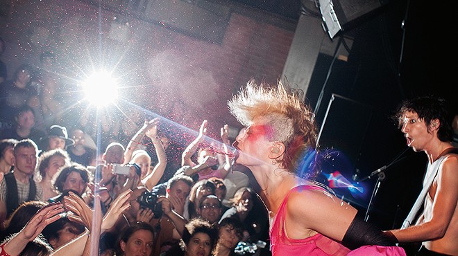 Peaches spraying the crowd with fake blood in Brooklyn in 2009.