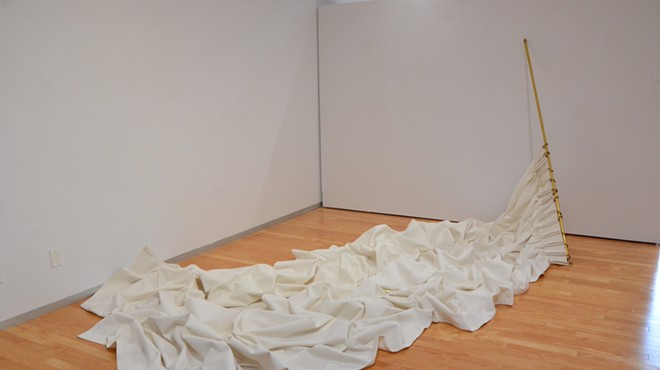 A 23-foot curtain dubbed Arctic Dreams anchors Karen Mahaffy’s Trinity exhibition “Objects of Absence.”