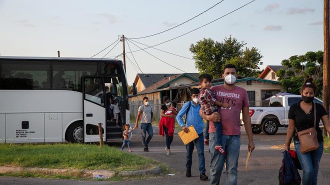A group of migrants are dropped off at Our Lady of Guadalupe Catholic Church in Mission on Wednesday.
