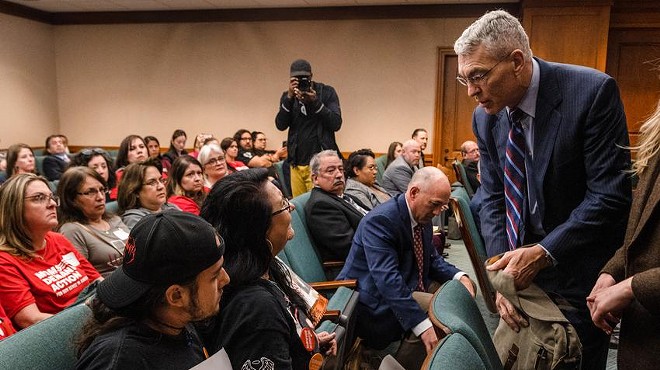 Velma Duran, the sister of Irma Garcia, one of the two teachers killed in the Robb Elementary school shooting, confronts Texas Department of Public Safety Director Steve McCraw after he finished testifying to the Homeland Security & Public Safety committee hearing at the state Capitol in Austin on Feb. 28, 2023. “They stood around and enabled the shooter to obliterate my sister. You couldn’t recognize her,” Duran said to McCraw. “Look at me!”