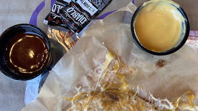 Taco Bell's new Grilled Cheese Dipping Taco is purportedly inspired by birria, but no stew was to be found — only nacho cheese and "savory red sauce."