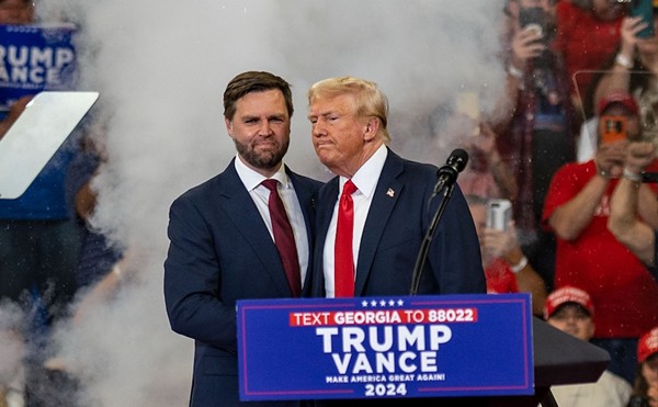 Former President Donald Trump and vice presidential nominee J.D. Vance appear at an Atlanta-area rally,