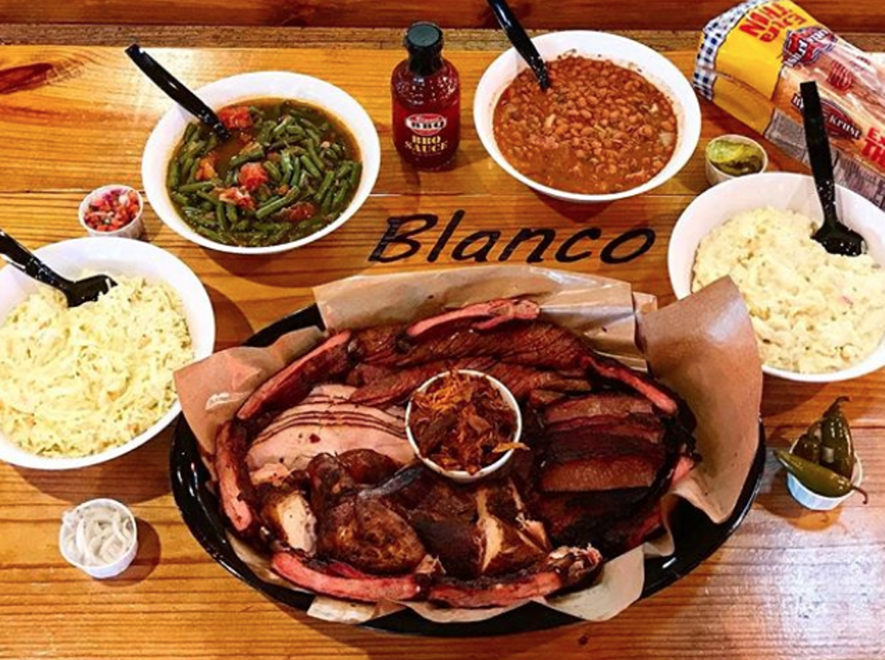 Blanco BBQ
13259 Blanco Road, (210) 251-2602, blancobbq.com
Carnivores with big appetites will want to head to Blanco BBQ, known for its hearty portions of smoked meats and classic sides. Served as either a plate or in a sandwich, the barbecue outpost serves brisket, ham, sausage, pulled prok, chicken fried steak and catfish if you’re in the mood. There’s even a drive-thru if you’re trying to indulge in some ‘cue at home or work.
Photo via Instagram / sanantoniomunchies