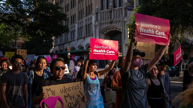 Thousands of people walk in an abortion rights march near downtown San Antonio on June 24.