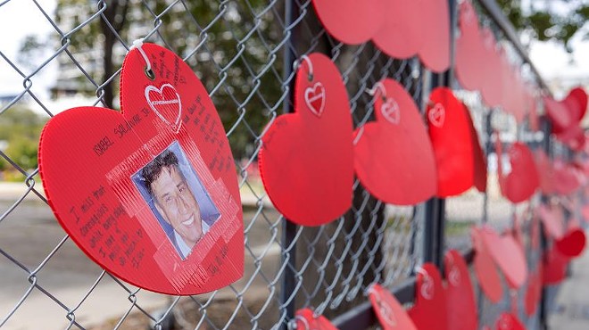 More than 3,400 red hearts were posted on a fence last year to honor San Antonio residents who have died from COVID-19 during the pandemic.
